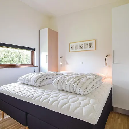 Сasa de vacaciones Casa De 4 Habitaciones Frente A La Playa En Børkop *