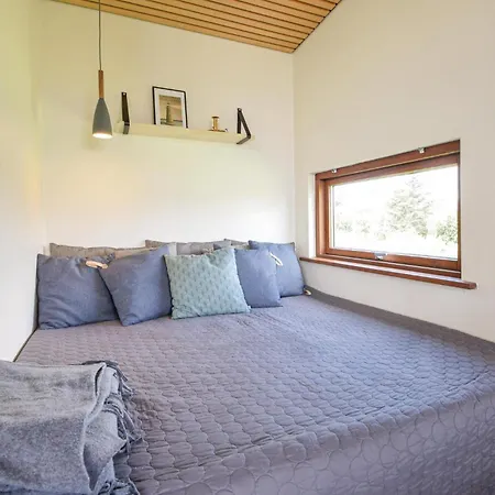 Сasa de vacaciones Casa De 4 Habitaciones Frente A La Playa En Børkop